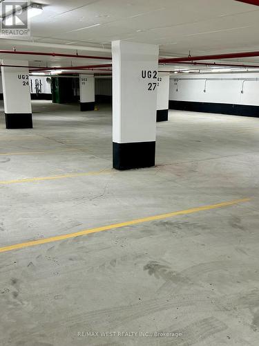 1831 - 2545 Simcoe Street N, Oshawa, ON - Indoor Photo Showing Garage