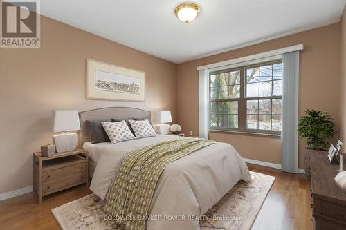 Virtual staging was used for this listing - 23 - 680 Commissioners Road W, London South (South M), ON - Indoor Photo Showing Bedroom