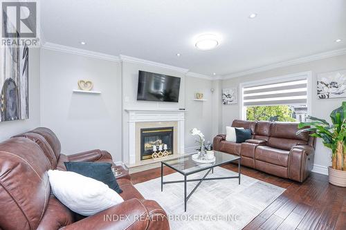 10 Leopard Gate, Brampton, ON - Indoor Photo Showing Living Room With Fireplace