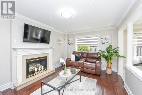 10 Leopard Gate, Brampton, ON - Indoor Photo Showing Living Room With Fireplace