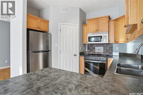 120 655 Kenderdine Road, Saskatoon, SK - Indoor Photo Showing Kitchen With Double Sink