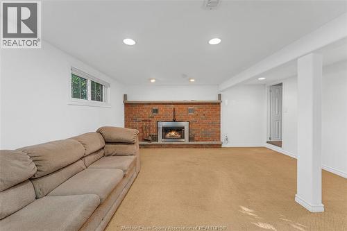 1005 Bouffard, Lasalle, ON - Indoor Photo Showing Living Room With Fireplace