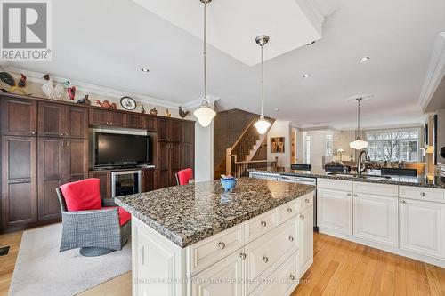 Well-Appointed Kitchen flows into Family Room/Den - 26 - 2369 Ontario Street, Oakville, ON - Indoor Photo Showing Kitchen With Upgraded Kitchen