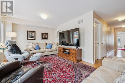 Hardwood Flooring T/O Versatile Lounge/Family Rm. - 26 - 2369 Ontario Street, Oakville, ON - Indoor Photo Showing Living Room