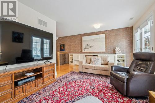 Hardwood Flooring T/O Versatile Lounge/Family Rm. - 26 - 2369 Ontario Street, Oakville, ON - Indoor Photo Showing Living Room