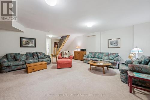 Recreation Room with Plush Broadloom - 26 - 2369 Ontario Street, Oakville, ON - Indoor Photo Showing Living Room