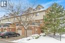View of front of property with brick siding, a balcony, and a garage - 33 Wellington S, Cambridge, ON  - Outdoor 
