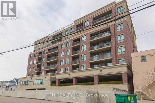 411 - 3563 Lake Shore Boulevard W, Toronto, ON - Outdoor With Balcony With Facade