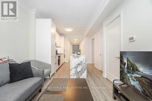 1207 - 18 Water Walk Drive, Markham, ON - Indoor Photo Showing Living Room