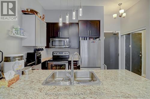 709 - 4070 Confederation Parkway, Mississauga, ON - Indoor Photo Showing Kitchen With Upgraded Kitchen