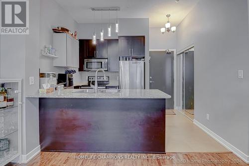 709 - 4070 Confederation Parkway, Mississauga, ON - Indoor Photo Showing Kitchen