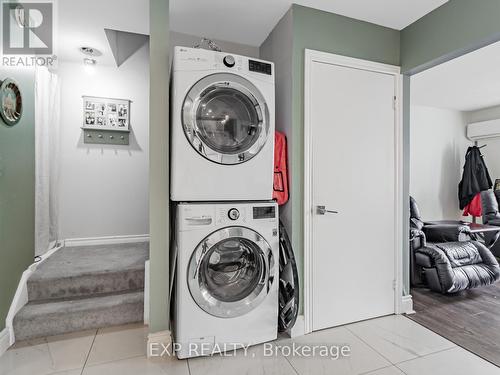 64 - 2050 Upper Middle Road, Burlington, ON - Indoor Photo Showing Laundry Room