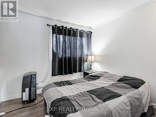64 - 2050 Upper Middle Road, Burlington, ON - Indoor Photo Showing Bedroom