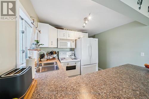 9 Beverly Street, Kawartha Lakes (Lindsay), ON - Indoor Photo Showing Kitchen With Double Sink