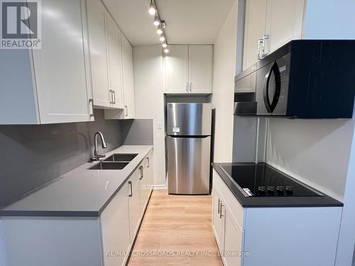 Unit 1 - 82 Curzon Street, Toronto, ON - Indoor Photo Showing Kitchen With Double Sink
