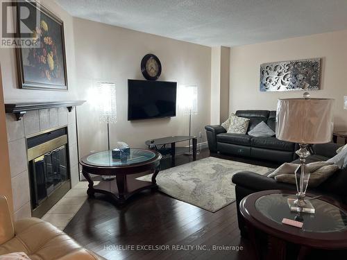 3408 Water Lily Court, Mississauga, ON - Indoor Photo Showing Living Room With Fireplace