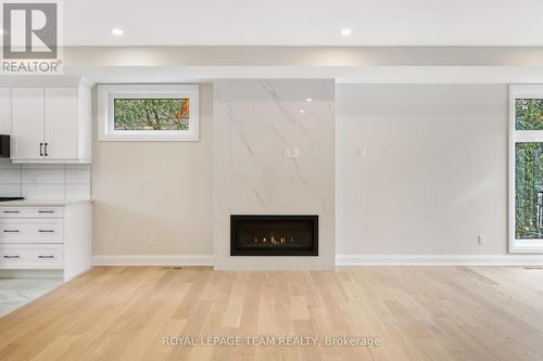 845 Melfa Crescent, Ottawa, ON - Indoor Photo Showing Other Room With Fireplace