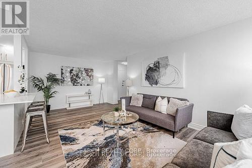 1108 - 3590 Kaneff Crescent, Mississauga, ON - Indoor Photo Showing Living Room