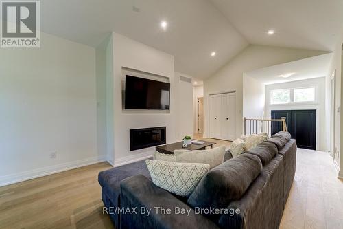 91 Summer View Avenue, Collingwood, ON - Indoor Photo Showing Other Room With Fireplace