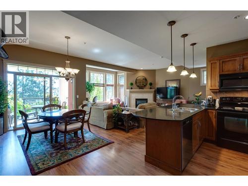 1795 Country Club Drive Unit# 105, Kelowna, BC - Indoor With Fireplace