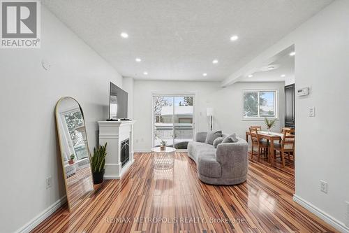 19 Robin Court, Barrie, ON - Indoor Photo Showing Living Room With Fireplace