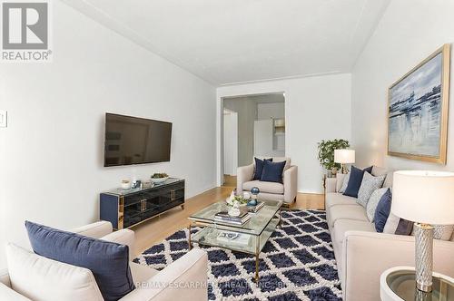 Virtually Staged - 22 Worsley Road, Hamilton, ON - Indoor Photo Showing Living Room