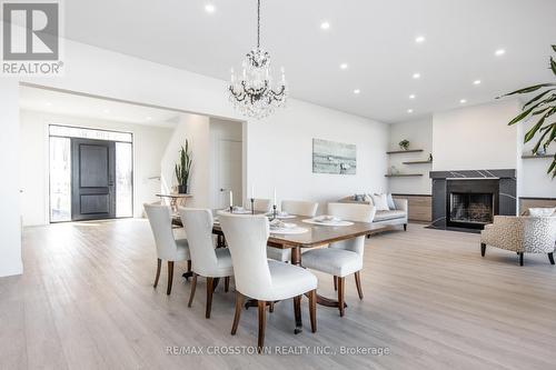 178 Moores Beach Road, Georgina, ON - Indoor Photo Showing Dining Room With Fireplace