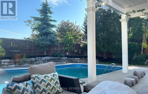 Summer Picture - 77 Colonel Bertram Road, Brampton, ON - Outdoor With In Ground Pool