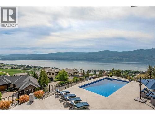 Pool perched above the other homes in area giving a commanding view - 1520 Vineyard Drive, West Kelowna, BC - Outdoor With Body Of Water With In Ground Pool With View