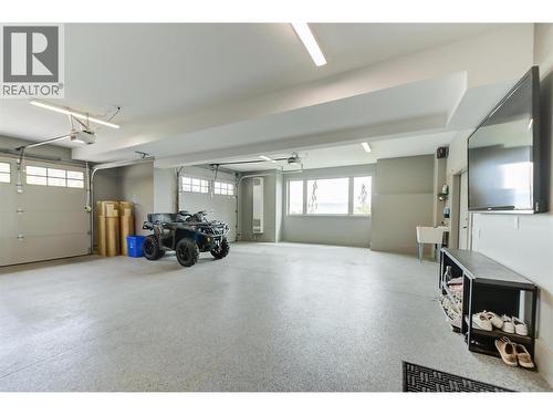 Dream garage - 1520 Vineyard Drive, West Kelowna, BC - Indoor Photo Showing Garage