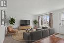 Living Room (Virtually Staged) - 1032 Lawrence Street, Clarence-Rockland, ON  - Indoor Photo Showing Living Room 