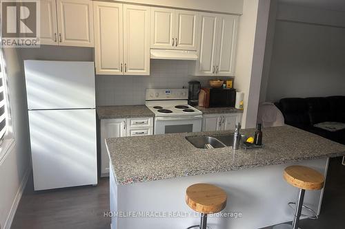 59 Doris Pawley Crescent, Caledon, ON - Indoor Photo Showing Kitchen With Double Sink