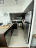 3906 - 208 Enfield Place, Mississauga, ON  - Indoor Photo Showing Kitchen With Double Sink 