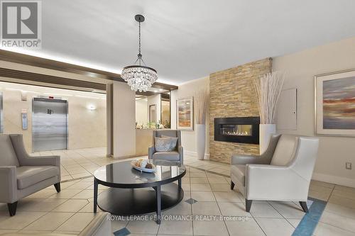 1702 - 1025 Richmond Road, Ottawa, ON - Indoor Photo Showing Living Room With Fireplace