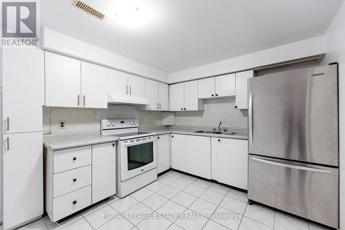 Eat-in Kitchen - 4129 Brandon Gate Drive, Mississauga, ON - Indoor Photo Showing Kitchen With Double Sink