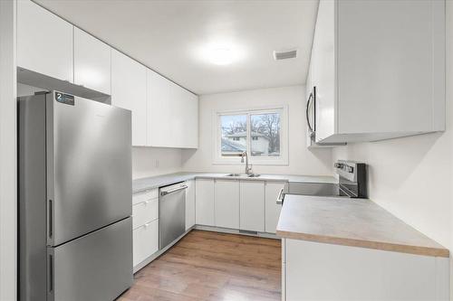 335 Milford Street, Winnipeg, MB - Indoor Photo Showing Kitchen With Double Sink