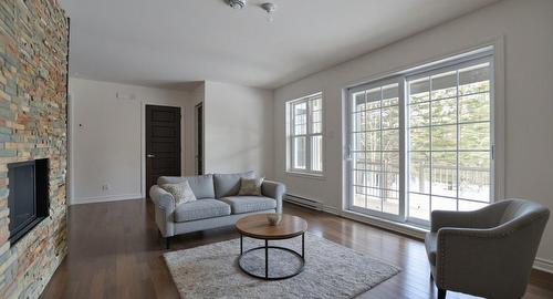 Salon - 1463 Rue Ovide, Val-David, QC - Indoor Photo Showing Living Room With Fireplace