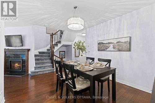 21 Kimberwick Crescent, Ottawa, ON - Indoor Photo Showing Dining Room With Fireplace