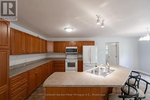 567 Sunset Cove Road, Callander, ON - Indoor Photo Showing Kitchen With Double Sink