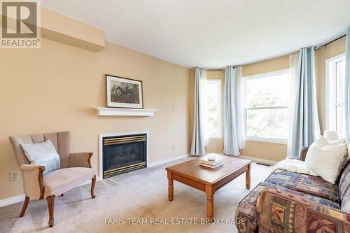 230 Mary Anne Drive, Barrie, ON - Indoor Photo Showing Living Room With Fireplace