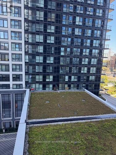 604 - 7 Mabelle Avenue, Toronto, ON - Outdoor With Balcony With Facade