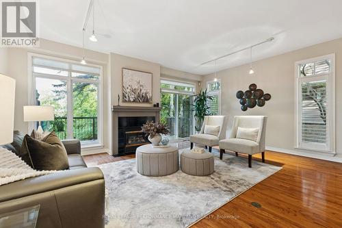 37 Creek'S End Lane, Ottawa, ON - Indoor Photo Showing Living Room With Fireplace