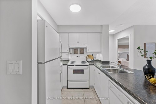 802-8 Rean Drive, Toronto, ON - Indoor Photo Showing Kitchen With Double Sink