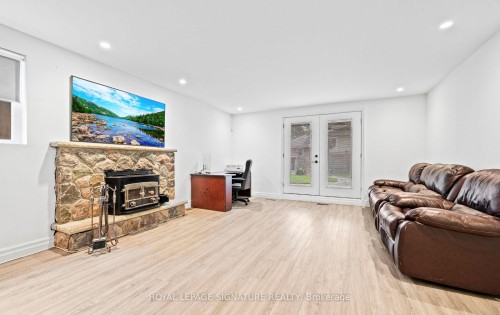 16 Kingsborough Crescent, Toronto, ON - Indoor Photo Showing Living Room With Fireplace