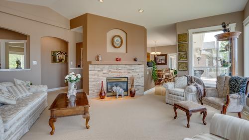 667 Mt. York Drive, Coldstream, BC - Indoor Photo Showing Living Room With Fireplace