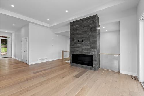 167 Heldon Court, West Kelowna, BC - Indoor Photo Showing Living Room With Fireplace