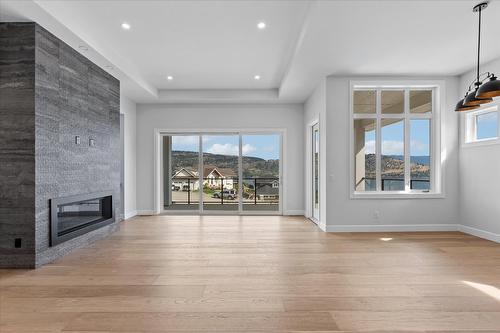 167 Heldon Court, West Kelowna, BC - Indoor Photo Showing Living Room With Fireplace