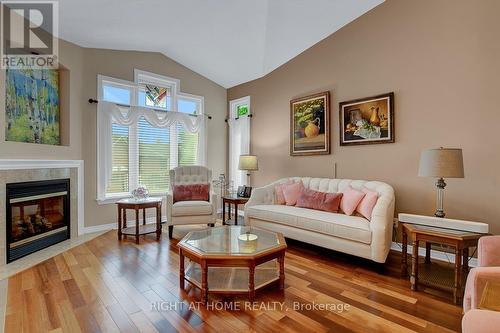 36 Sable Run Drive, Ottawa, ON - Indoor Photo Showing Living Room With Fireplace