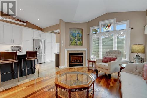 36 Sable Run Drive, Ottawa, ON - Indoor Photo Showing Living Room With Fireplace