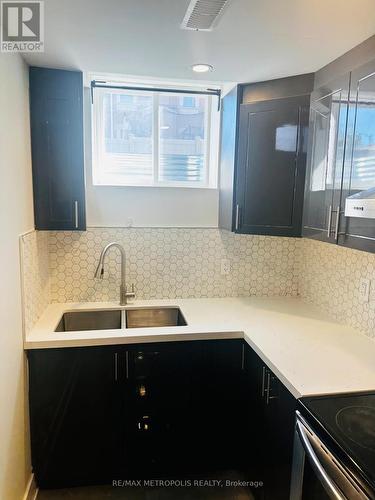 15 Dalecrest Road, Brampton, ON - Indoor Photo Showing Kitchen With Double Sink